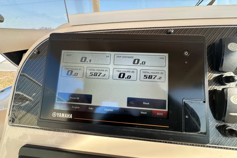 Slide: The Image of Yamaha display on 2020 Grady-White Canyon 271 boat showing trip and engine data. - 26