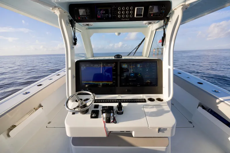 Slide: The Image of Cockpit of 2021 Freeman 47 boat with advanced navigation system on open sea. - 20