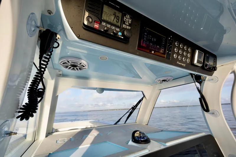 Slide: The Image of Interior view of a 2021 Freeman 47 boat cockpit with navigation equipment. - 22