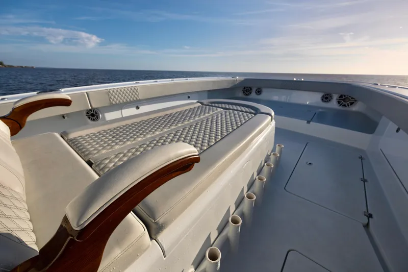 Slide: The Image of Luxurious 2021 Freeman 47 boat interior with cushioned seating and ocean view. - 24