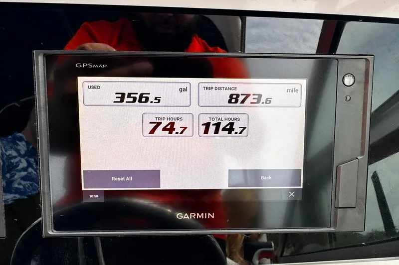 Slide: The Image of Garmin GPS display on 2021 Regal 26 XO showing trip data and fuel usage. - 12
