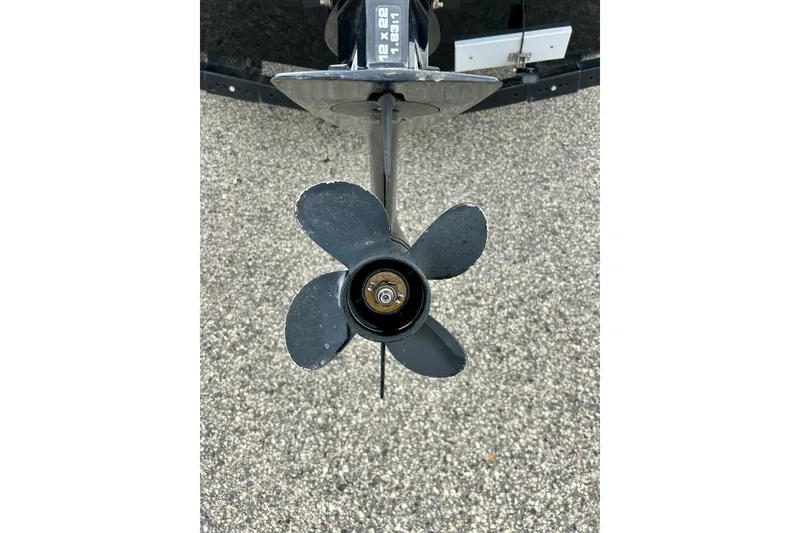 Slide: The Image of Propeller of 2018 Crestliner CVN16 boat on textured surface background. - 11