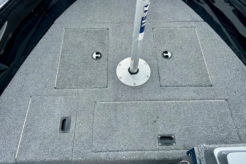 Slide: The Image of 2018 Crestliner CVN16 boat deck with storage compartments and pedestal base. - 13