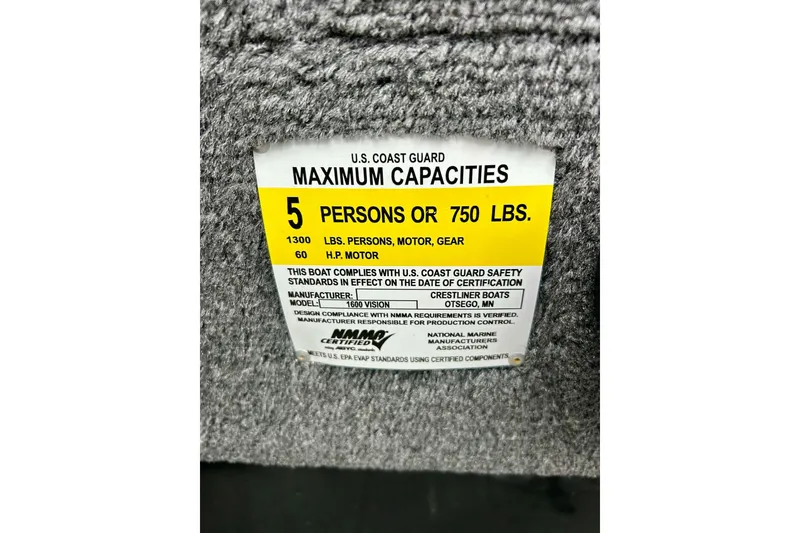 Slide: The Image of 2018 Crestliner CVN16 capacity label, 5 persons or 750 lbs, U.S. Coast Guard compliant. - 23