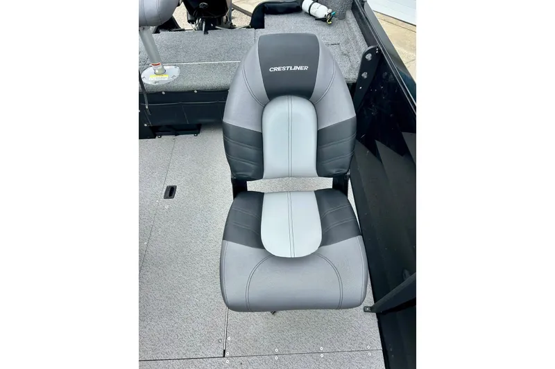 Slide: The Image of Crestliner CVN16 2018 boat seat, gray and black upholstery, on deck. - 25