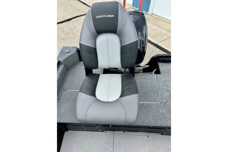 Slide: The Image of Crestliner CVN16 2018 boat seat, gray and black upholstery, on deck. - 27