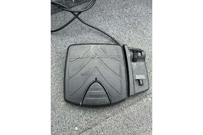 Slide: The Image of Foot pedal control on 2018 Crestliner CVN16 boat, featuring Minn Kota branding. - 39
