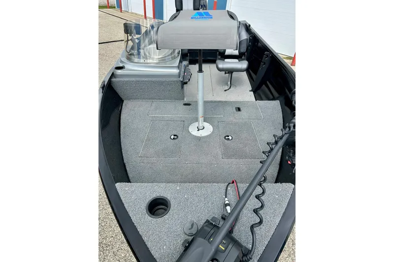 Slide: The Image of 2018 Crestliner CVN16 boat interior with carpeted deck and fishing seat. - 4