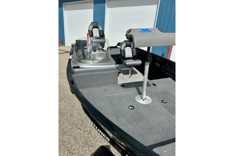 Slide: The Image of 2018 Crestliner CVN16 boat interior with seating and control panel. - 5
