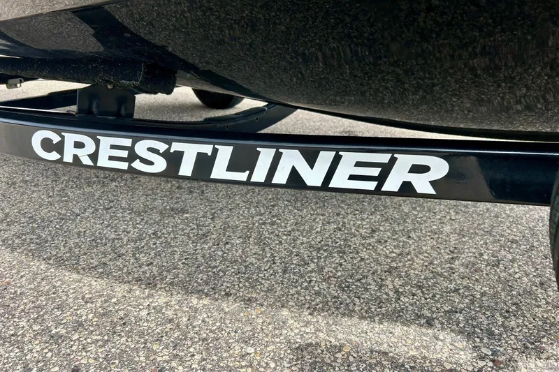 Slide: The Image of 2018 Crestliner CVN16 trailer detail on asphalt surface. - 6