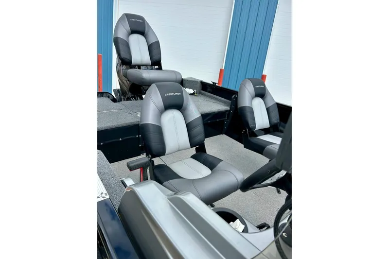 Slide: The Image of 2018 Crestliner CVN16 boat interior with gray and black seating. - 9