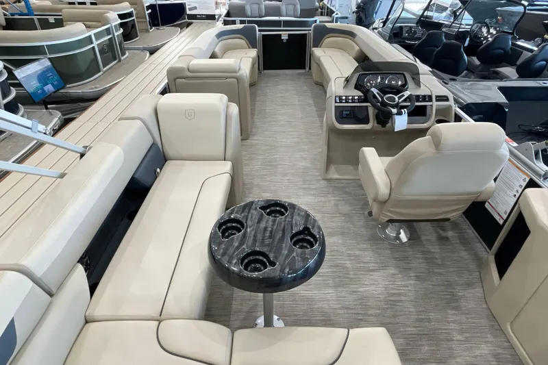 Slide: The Image of Luxurious interior of 2026 Godfrey Sweetwater 2286 C pontoon boat with plush seating. - 15