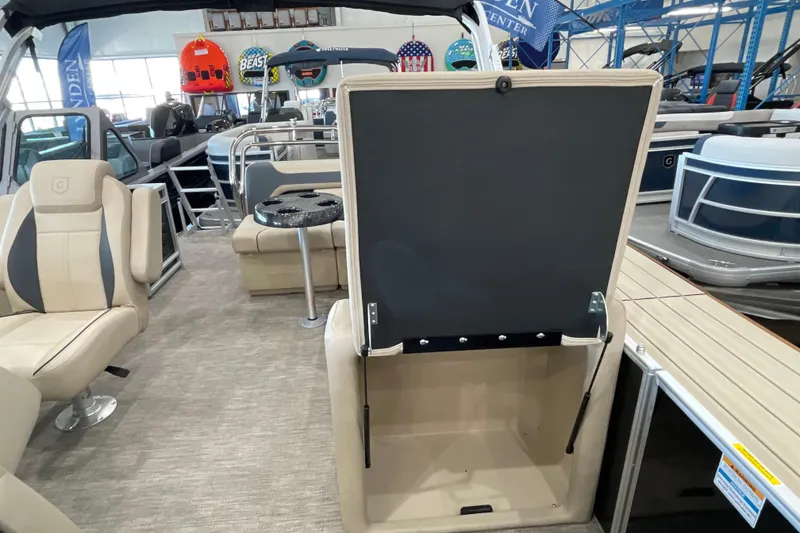 Slide: The Image of 2026 Godfrey Sweetwater 2286 C pontoon boat interior with seating and storage. - 18