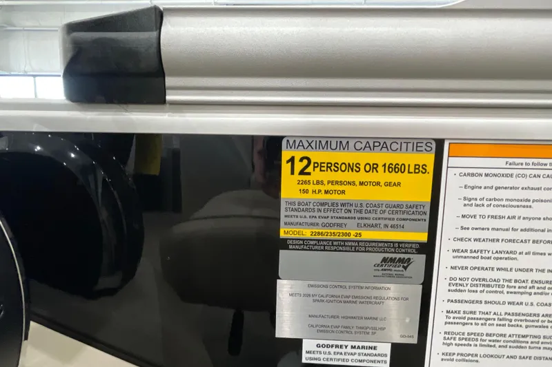 Slide: The Image of 2026 Godfrey Sweetwater 2286 C capacity label, 12 persons or 1660 lbs, 150 HP motor. - 19