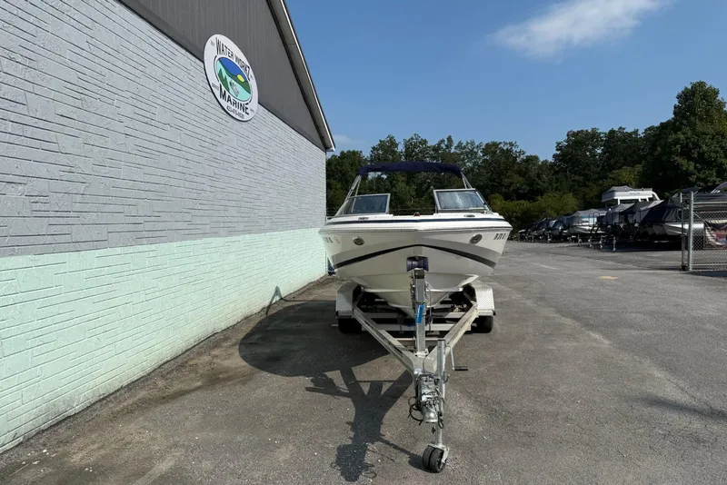 Slide: The Image of 2006 Regal 2000 Bowrider boat on trailer at Water Works Marine dealership. - 2