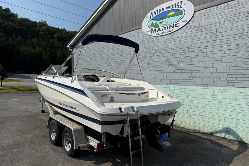 Slide: The Image of 2006 Regal 2000 Bowrider boat on trailer at Water Workz Marine dealership. - 3