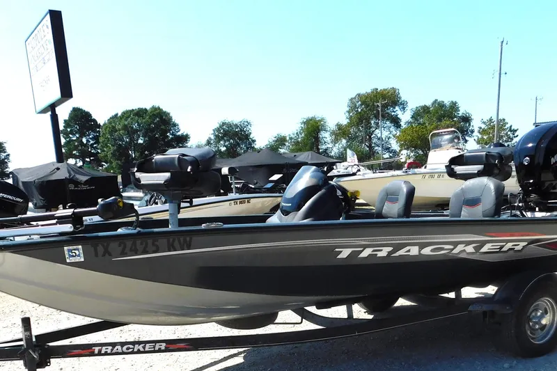 Slide: The Image of 2022 Tracker Pro Team 175 boat on trailer in outdoor dealership lot. - 3