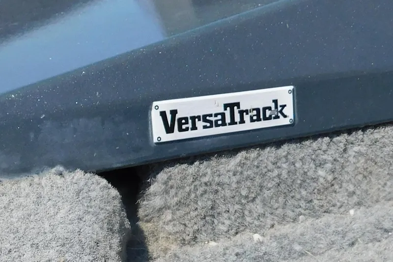 Slide: The Image of VersaTrack label on 2022 Tracker Pro Team 175 boat, featuring textured surface. - 4