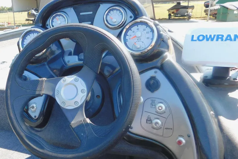 Slide: The Image of Steering console of 2022 Tracker Pro Team 175 boat with gauges and controls. - 5