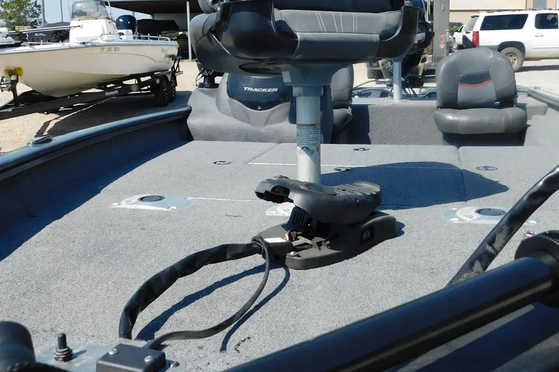 Slide: The Image of 2022 Tracker Pro Team 175 boat interior with seating and equipment. - 8