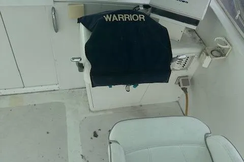 Slide: The Image of 2002 Bob Sherbert and Lou Rambo Custom Sportfish interior with "Warrior" cover. - 14