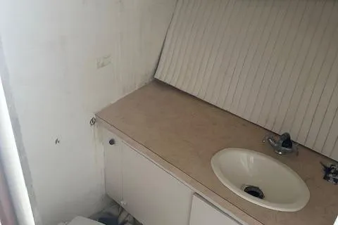 Slide: The Image of 2002 Bob Sherbert and Lou Rambo Custom Sportfish bathroom with sink and countertop. - 7
