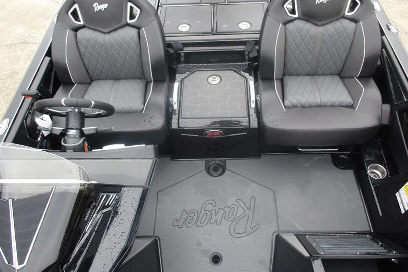 Slide: The Image of 2026 Ranger Z520R Cup-Equipped boat interior with dual seats and steering wheel. - 11