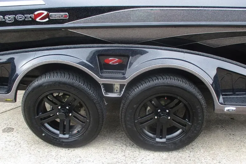 Slide: The Image of 2026 Ranger Z520R Cup-Equipped trailer with black wheels and sleek design. - 3