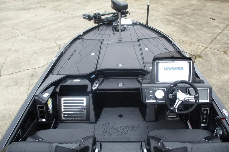Slide: The Image of 2026 Ranger Z520R Cup-Equipped boat interior with Lowrance electronics and sleek black design. - 8