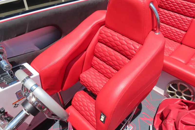 Slide: The Image of Red leather interior of 2009 Donzi 35ZR boat with quilted seats and steering wheel. - 25