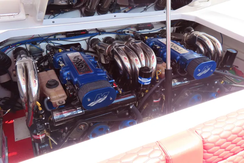 Slide: The Image of Twin engines in a 2009 Donzi 35ZR boat, showcasing powerful performance. - 5