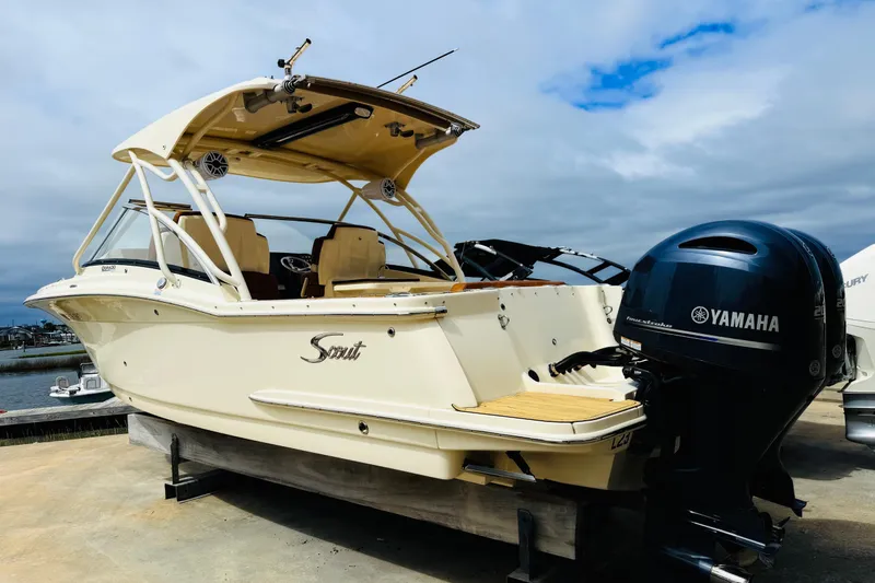 Slide: The Image of 2023 Scout 255 Dorado boat with Yamaha outboard motor on display. - 2