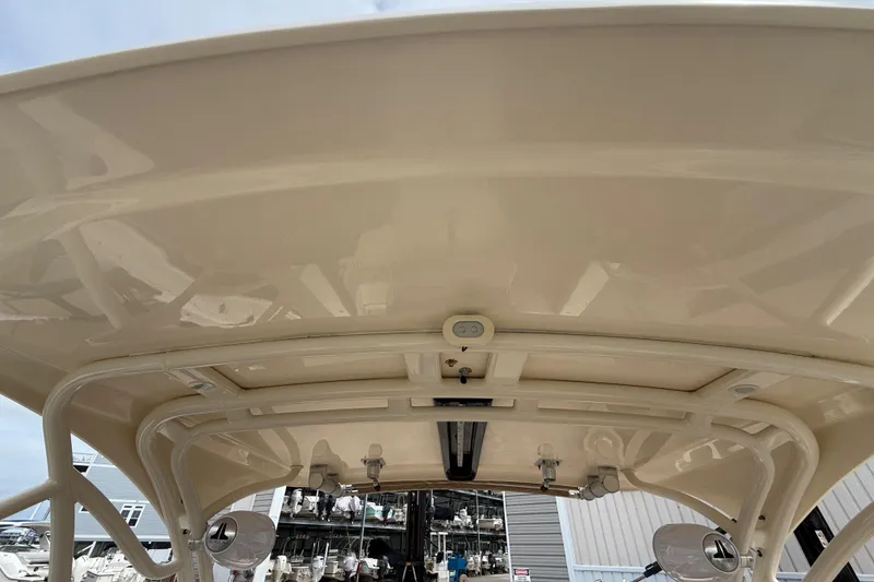 Slide: The Image of 2023 Scout 255 Dorado boat's interior roof view with mounted equipment. - 24