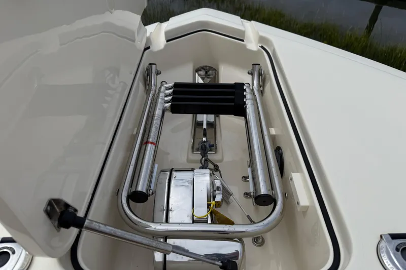 Slide: The Image of 2023 Scout 255 Dorado boat ladder and storage compartment detail. - 32