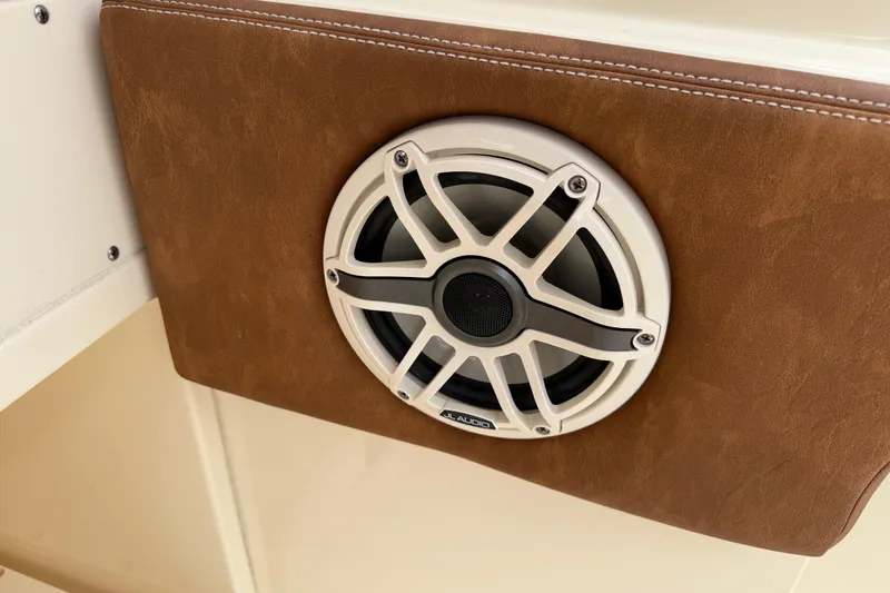 Slide: The Image of Speaker on 2023 Scout 255 Dorado boat, mounted on brown panel. - 35