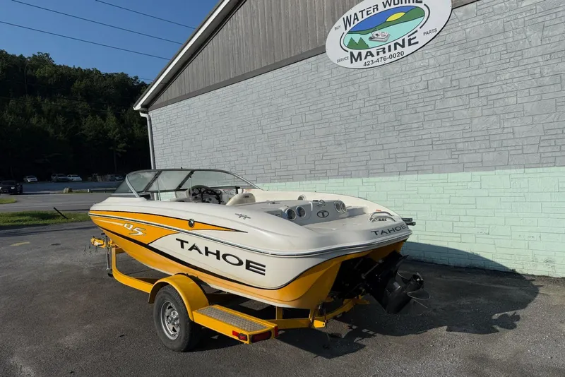 Slide: The Image of 2013 Tahoe Q5 boat on trailer at Water World Marine dealership. - 3