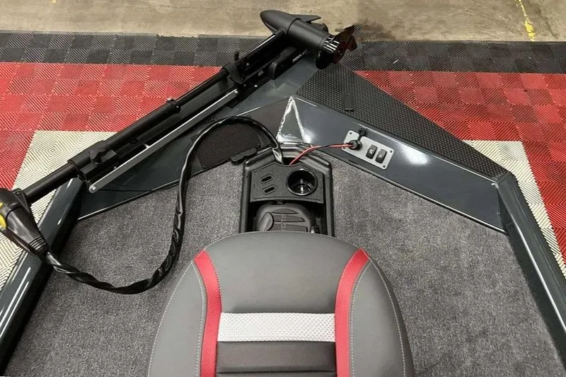 Slide: The Image of 2026 Ranger RT178 boat interior with seat, control panel, and trolling motor. - 4