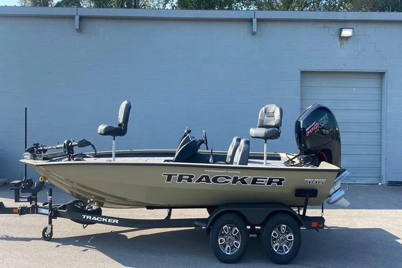The Image of 2026 Tracker Pro Team 195 boat on trailer, parked outdoors. - 0