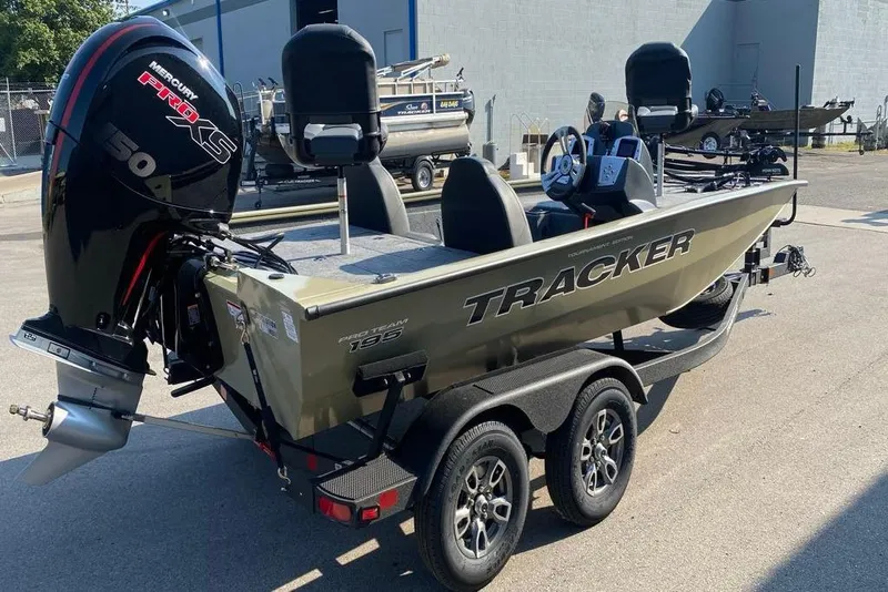 Slide: The Image of 2026 Tracker Pro Team 195 boat with Mercury 150 engine on trailer. - 5