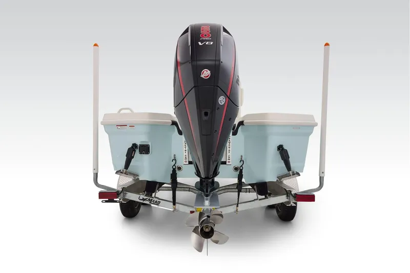 Slide: The Image of Rear view of 2026 Mako 24 APEX boat with ladder and trailer details. - 73
