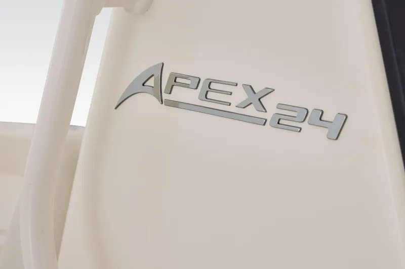 Slide: The Image of 2026 Mako 24 APEX boat logo on a sleek white surface. - 22