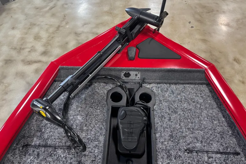 Slide: The Image of 2026 Tracker Pro Team 195 boat with trolling motor and red deck. - 5