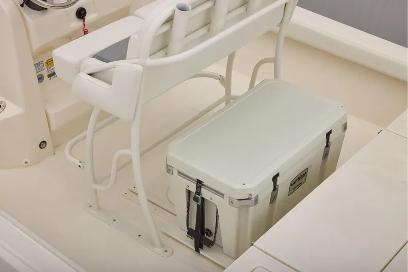 Slide: The Image of Interior of 2026 Mako 24 APEX boat with seating and cooler storage. - 39