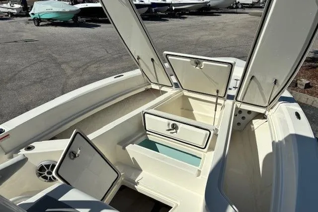 Slide: The Image of Top view of 2026 Mako 24 APEX boat, showcasing spacious deck and seating arrangement. - 5