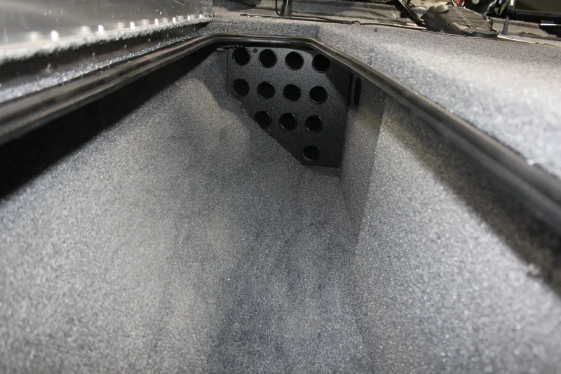 Slide: The Image of Interior storage compartment of 2026 Tracker Pro Team 195 boat, featuring carpeted finish. - 15