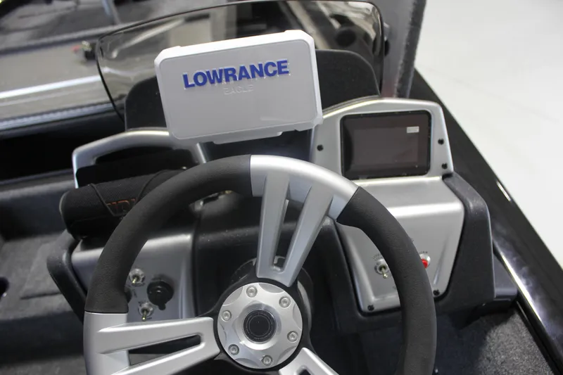 Slide: The Image of Steering console of 2026 Tracker Pro Team 195 boat with Lowrance electronics. - 19
