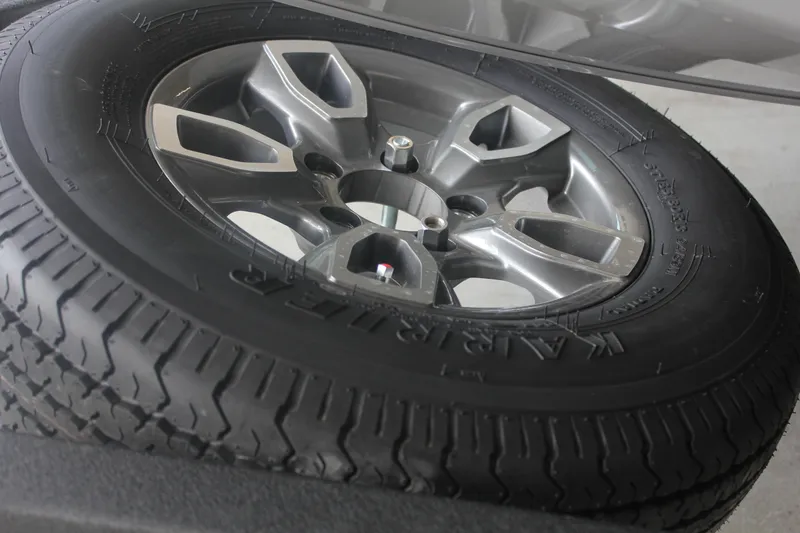 Slide: The Image of 2026 Tracker Pro Team 195 tire and alloy wheel close-up. - 4