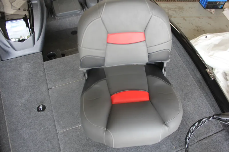 Slide: The Image of 2026 Tracker Pro Team 195 boat seat with gray and red upholstery. - 7