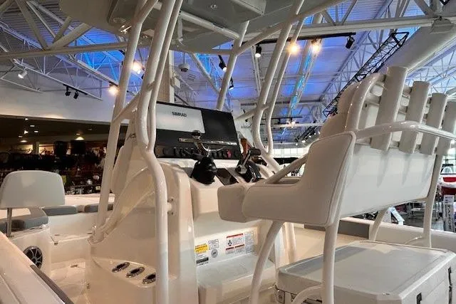 Slide: The Image of Top view of 2026 Mako 24 APEX boat, showcasing spacious deck and seating arrangement. - 5