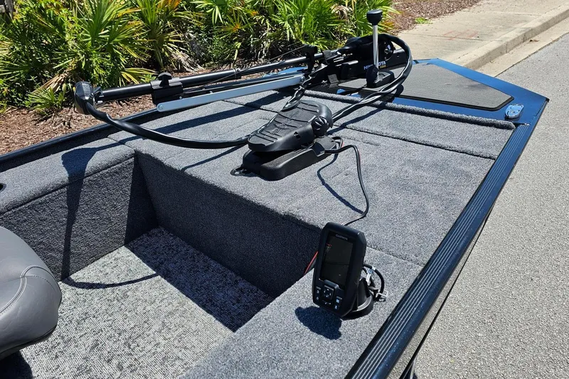 Slide: The Image of 2026 Tracker Panfish 17 boat deck with trolling motor and fish finder. - 5
